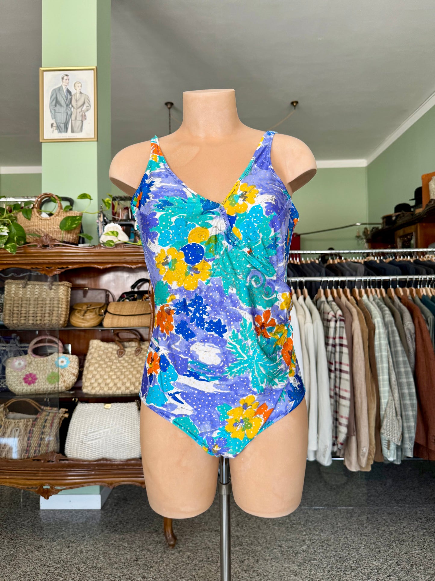 Costume intero lilla con fiori arancio/gialli- TG. 44/46
