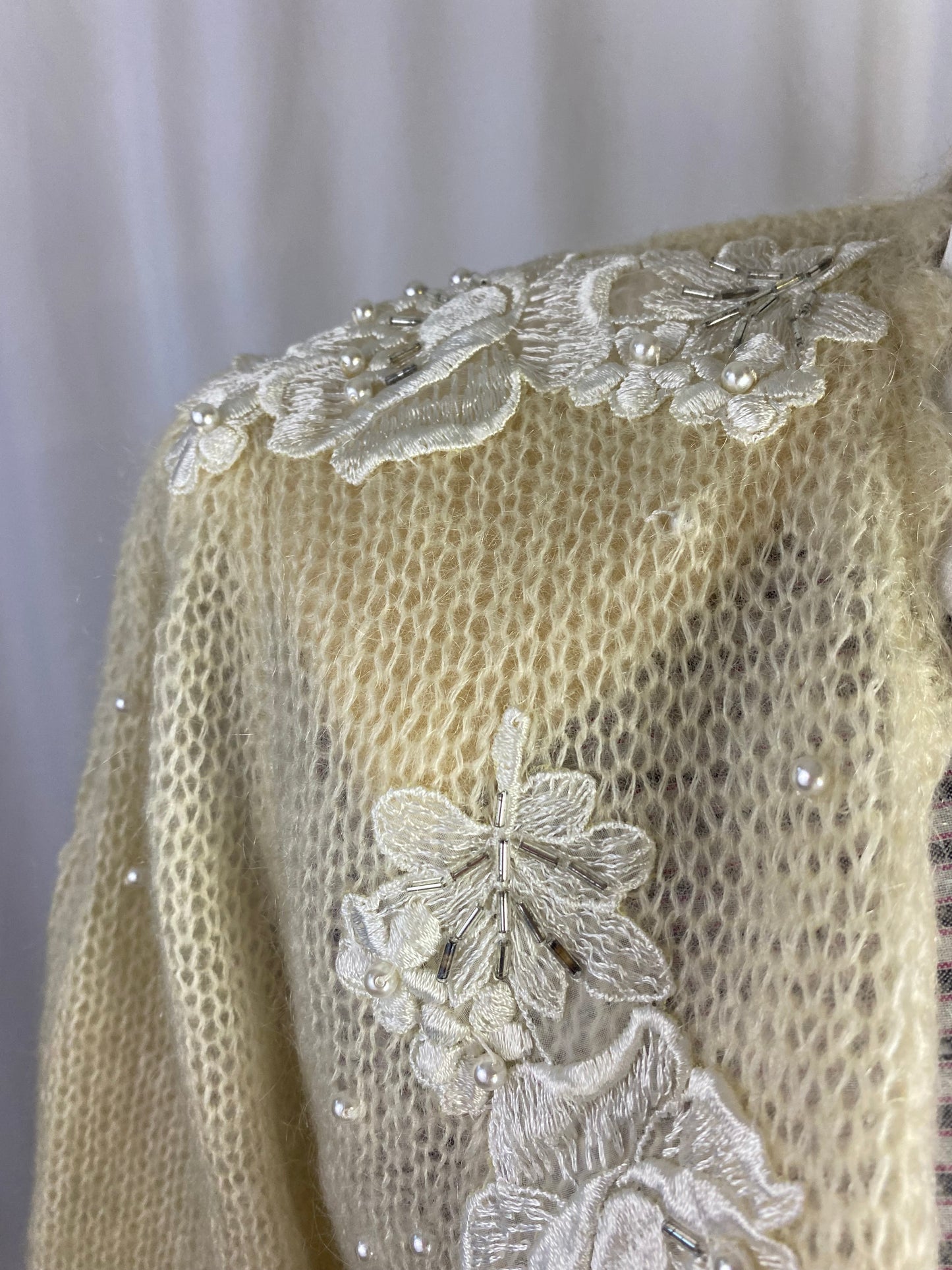 Cardigan con perline
