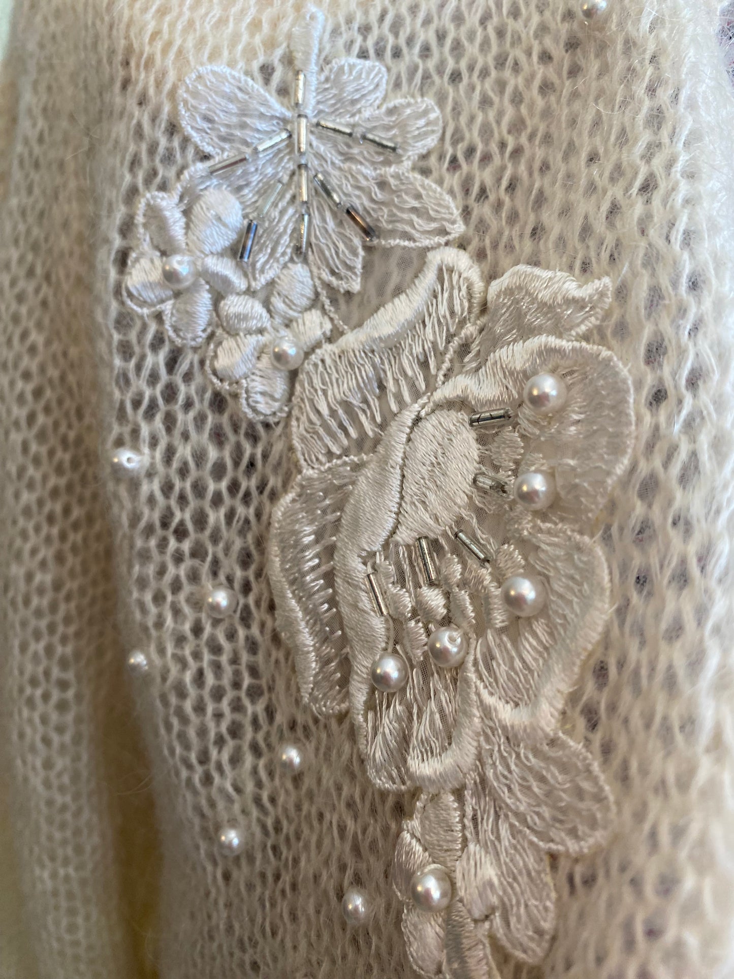 Cardigan con perline