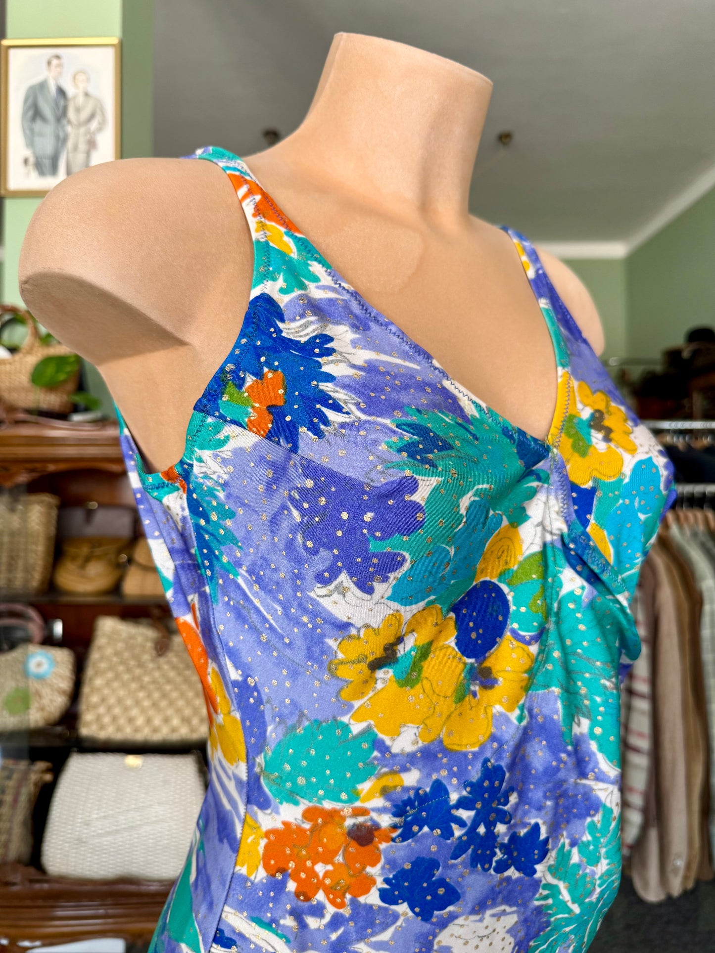 Costume intero lilla con fiori arancio/gialli- TG. 44/46
