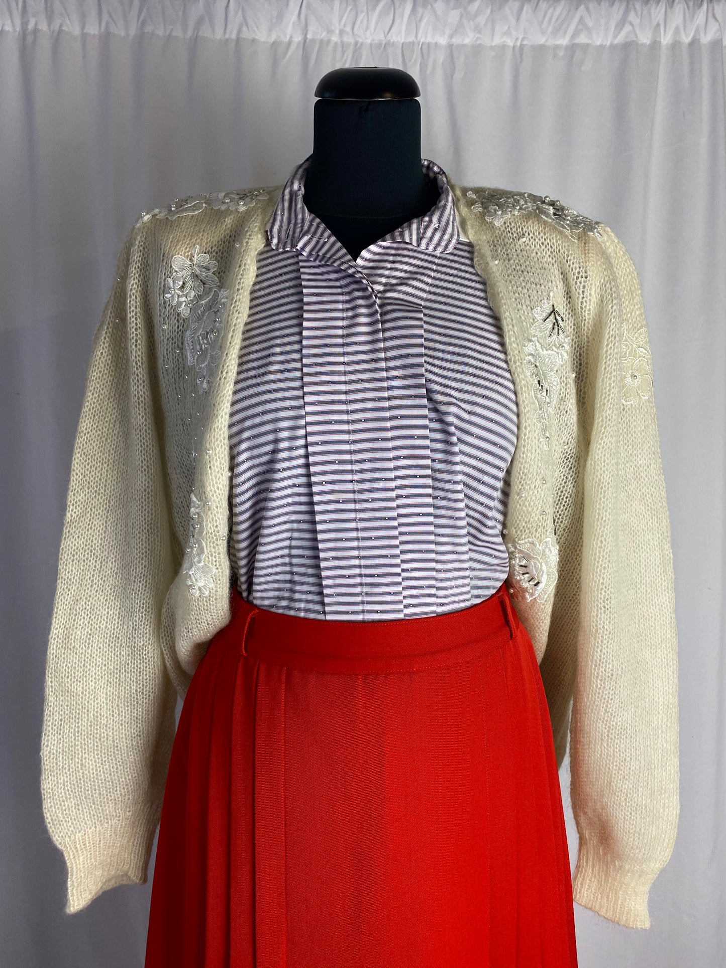 Cardigan con perline