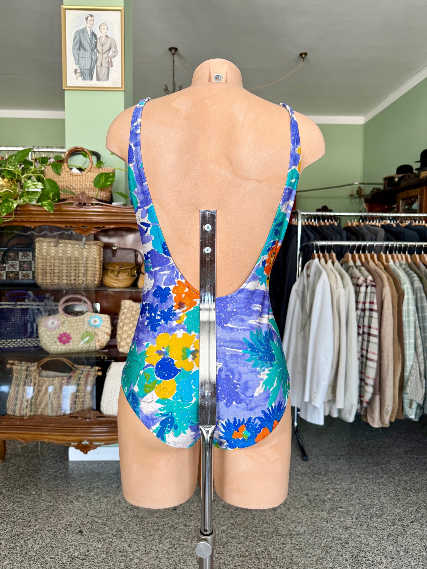 Costume intero lilla con fiori arancio/gialli- TG. 44/46