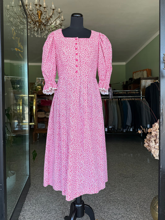 Abito tirolese rosa con micro-fiori
- TG. 44/46