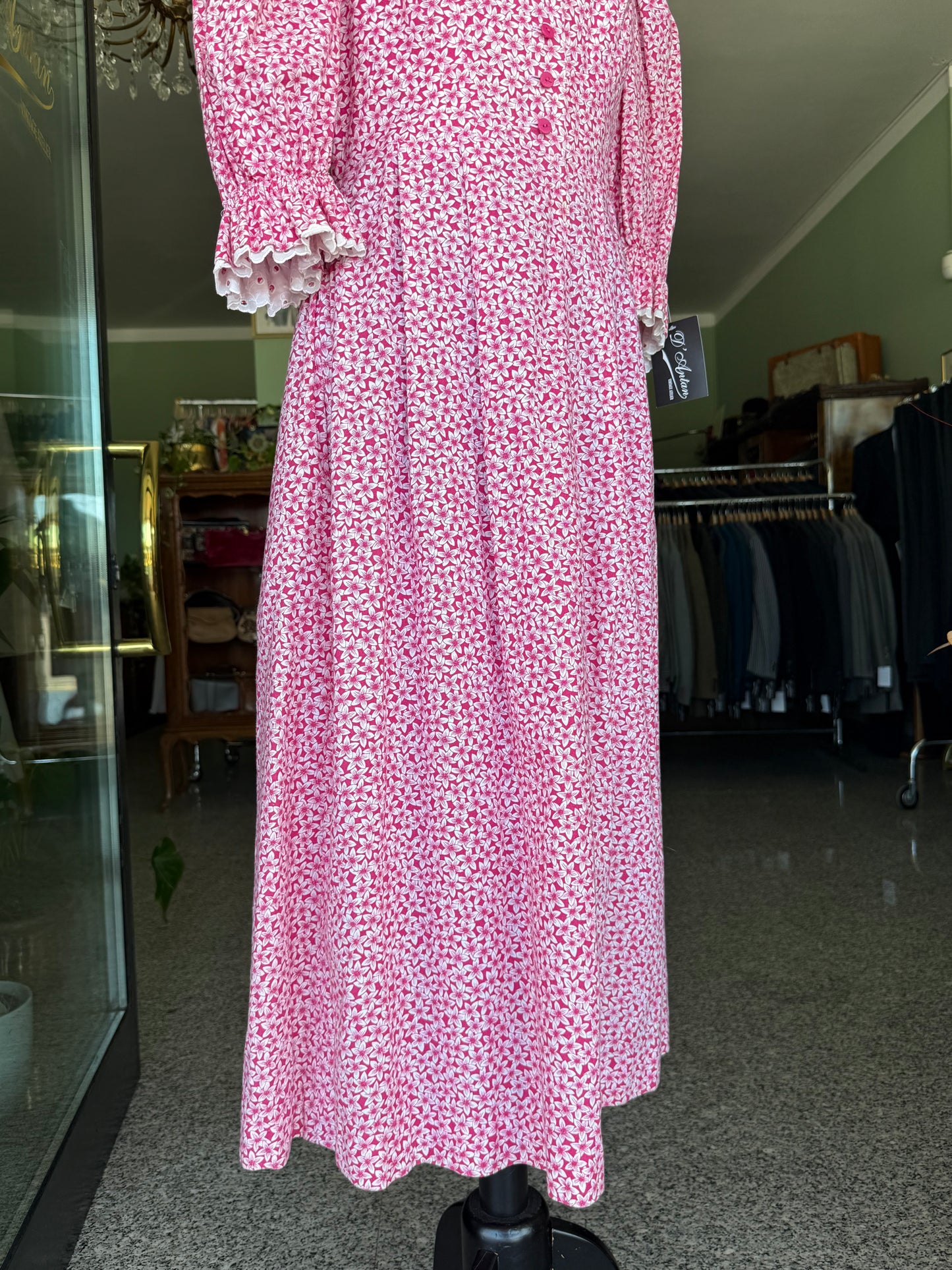 Abito tirolese rosa con micro-fiori
- TG. 44/46