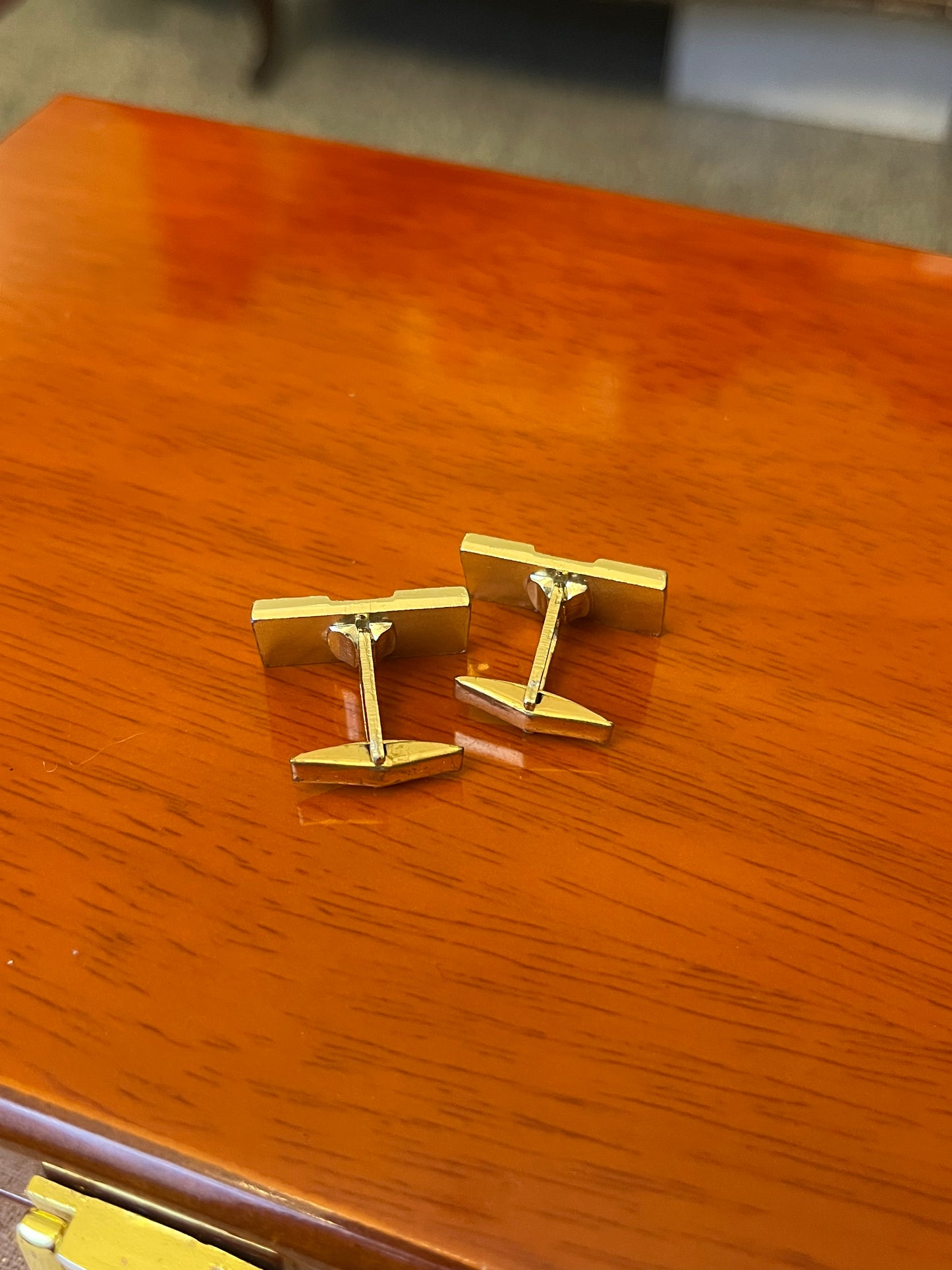 Gemelli dorati e argentati rettangolari