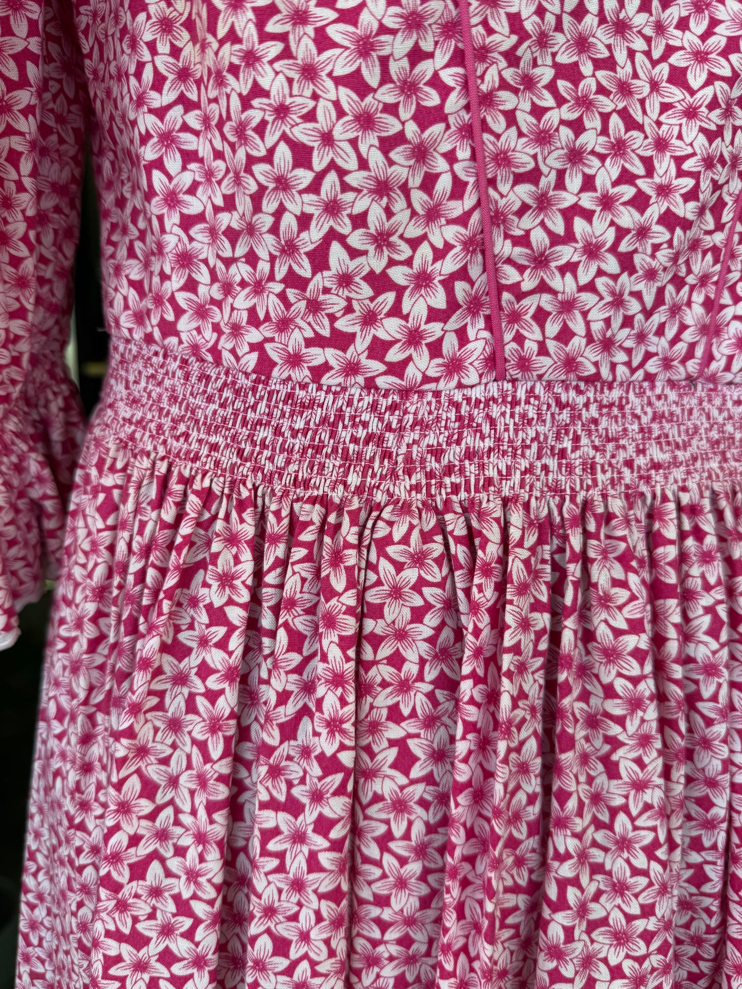 Abito tirolese rosa con micro-fiori
- TG. 44/46