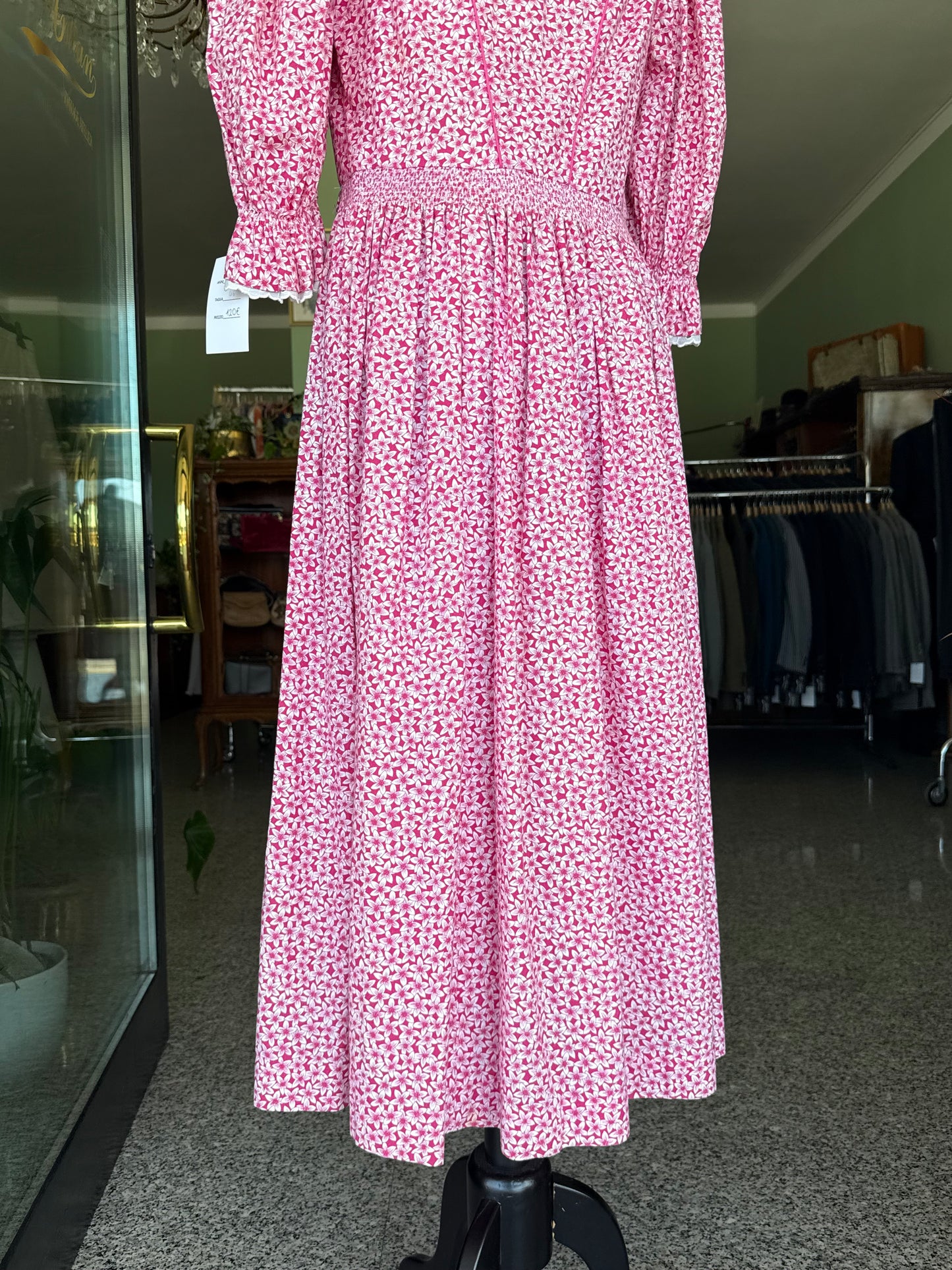 Abito tirolese rosa con micro-fiori
- TG. 44/46